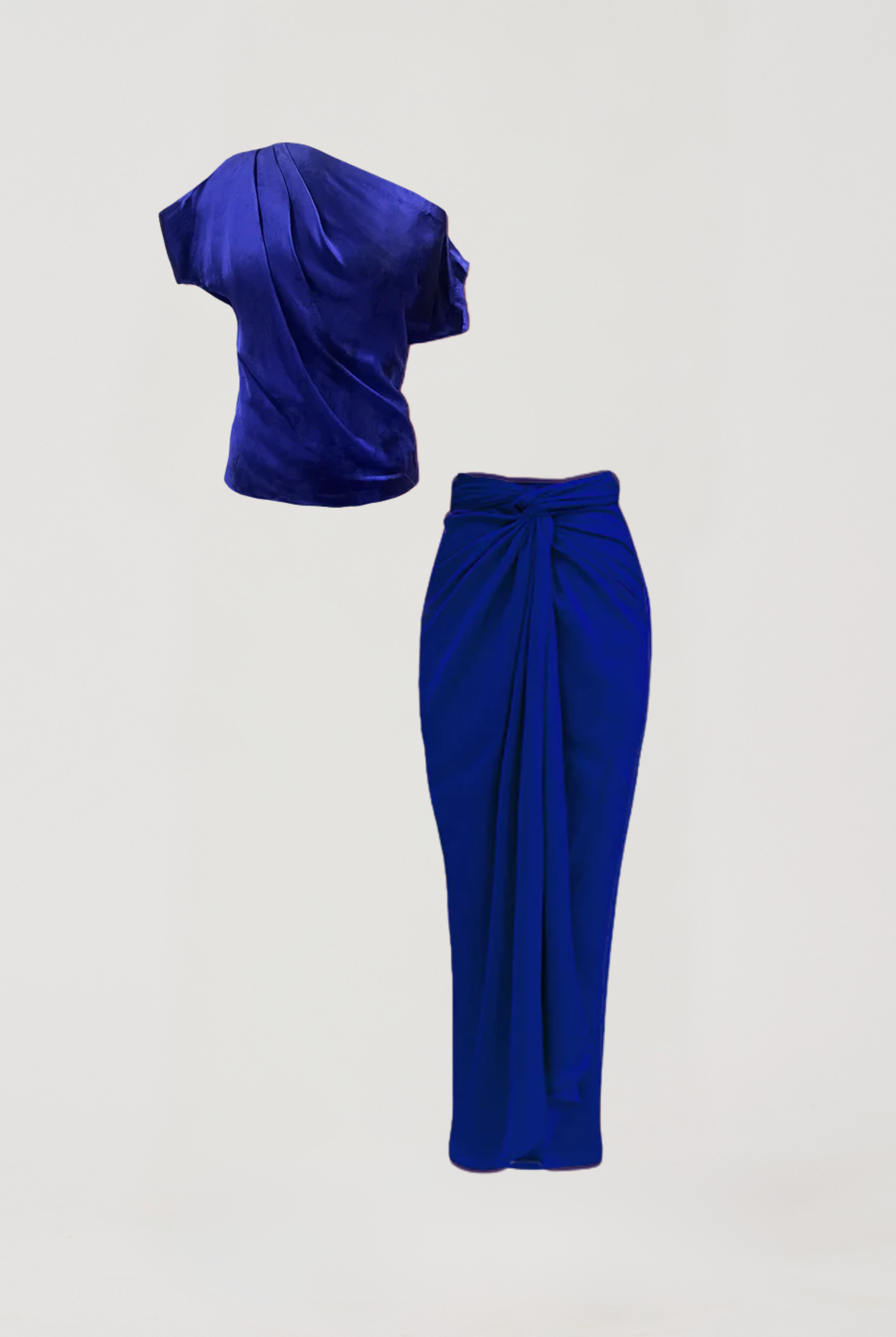 Maya Set in Blue: Off-shoulder cowl drape with draped skirt and sarong in blue from Aroka.