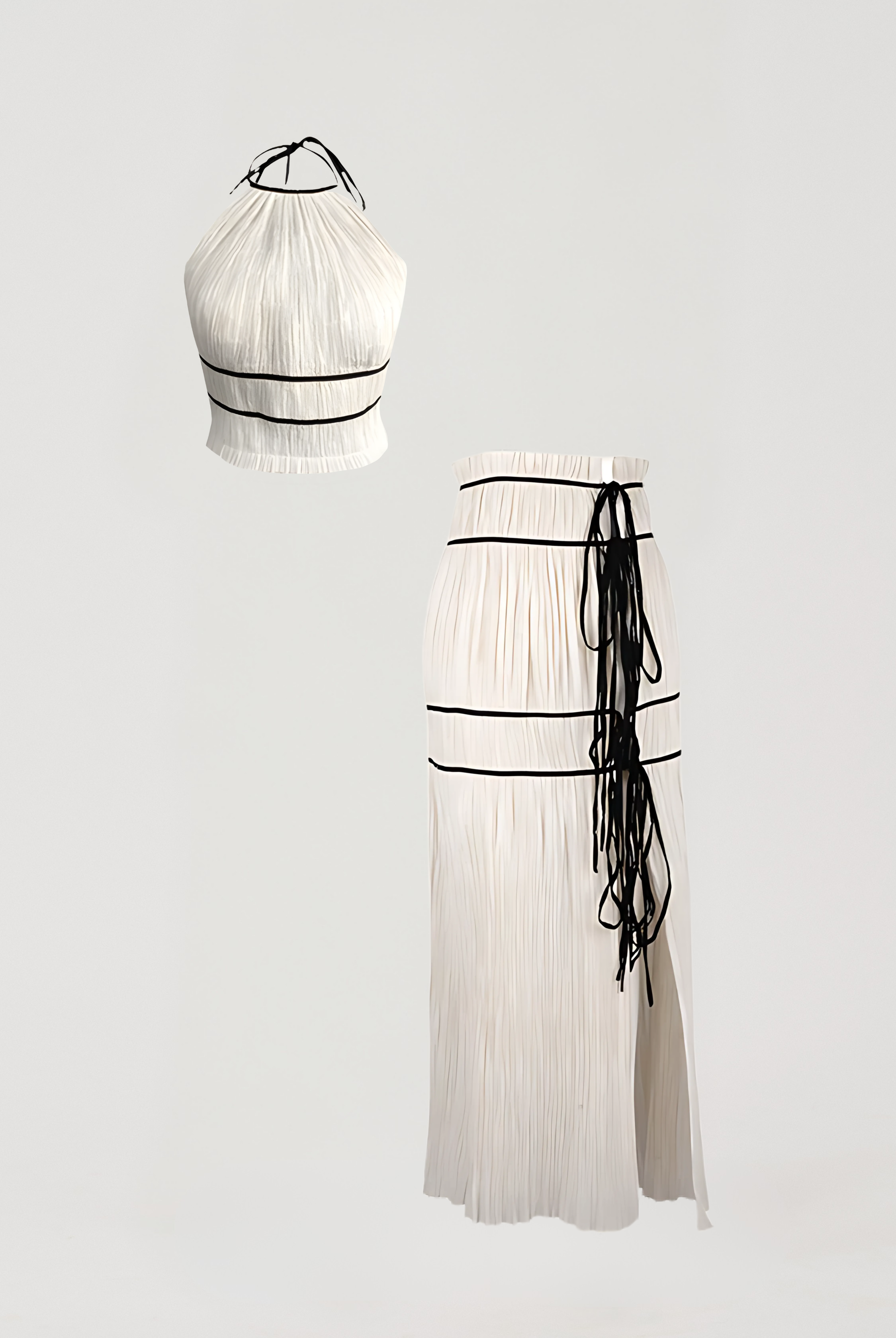 Modern Love by Aroka- Amour halter neck top with black piping details and back tie-ups paired with Amour skirt in creme.