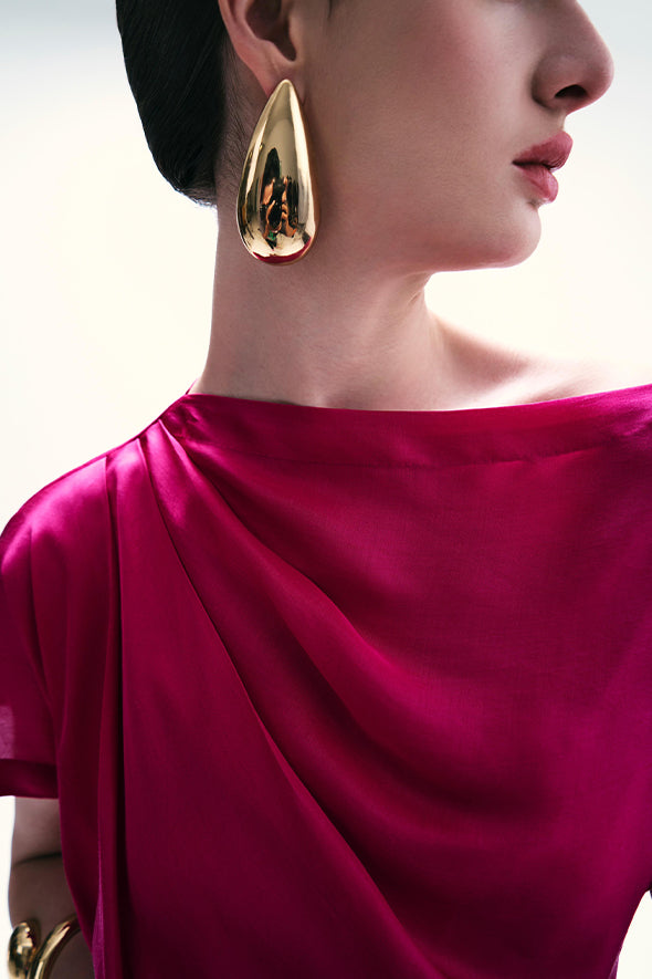 Loose fit pink off-shoulder cowl drape top from Aroka.