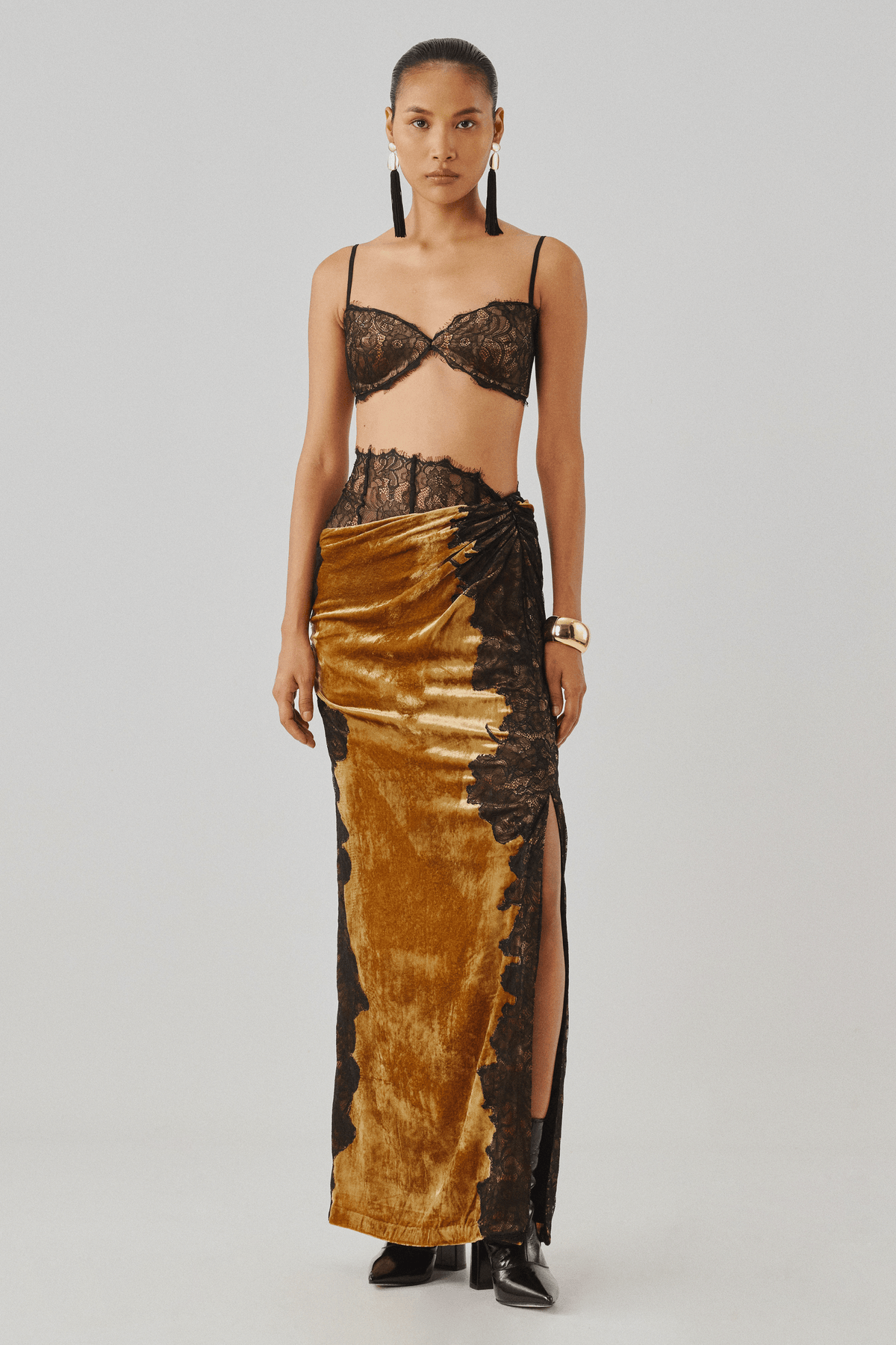 Bronze printed wrap top with a matching draped skirt, close-up