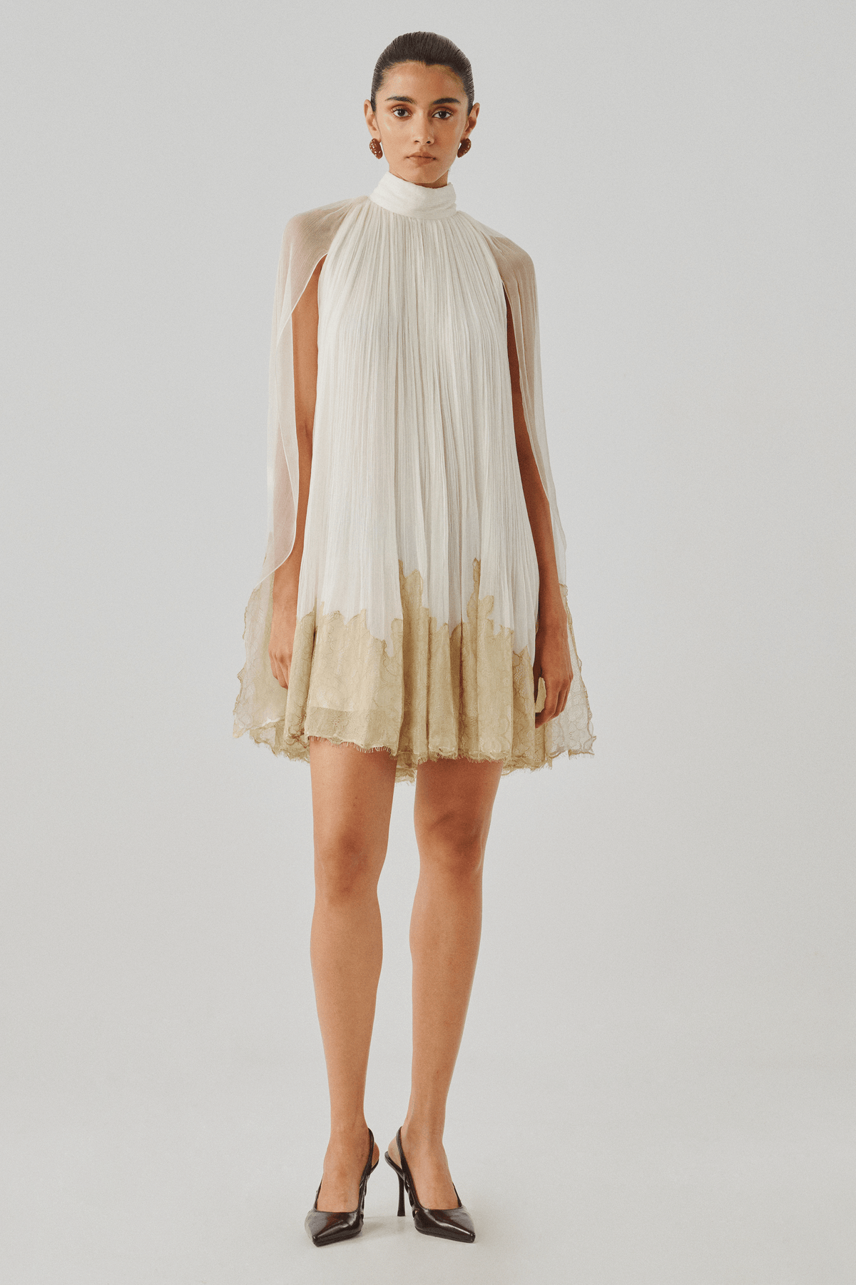 Ivory tiered mini dress with dip-dyed gold hem, front full view