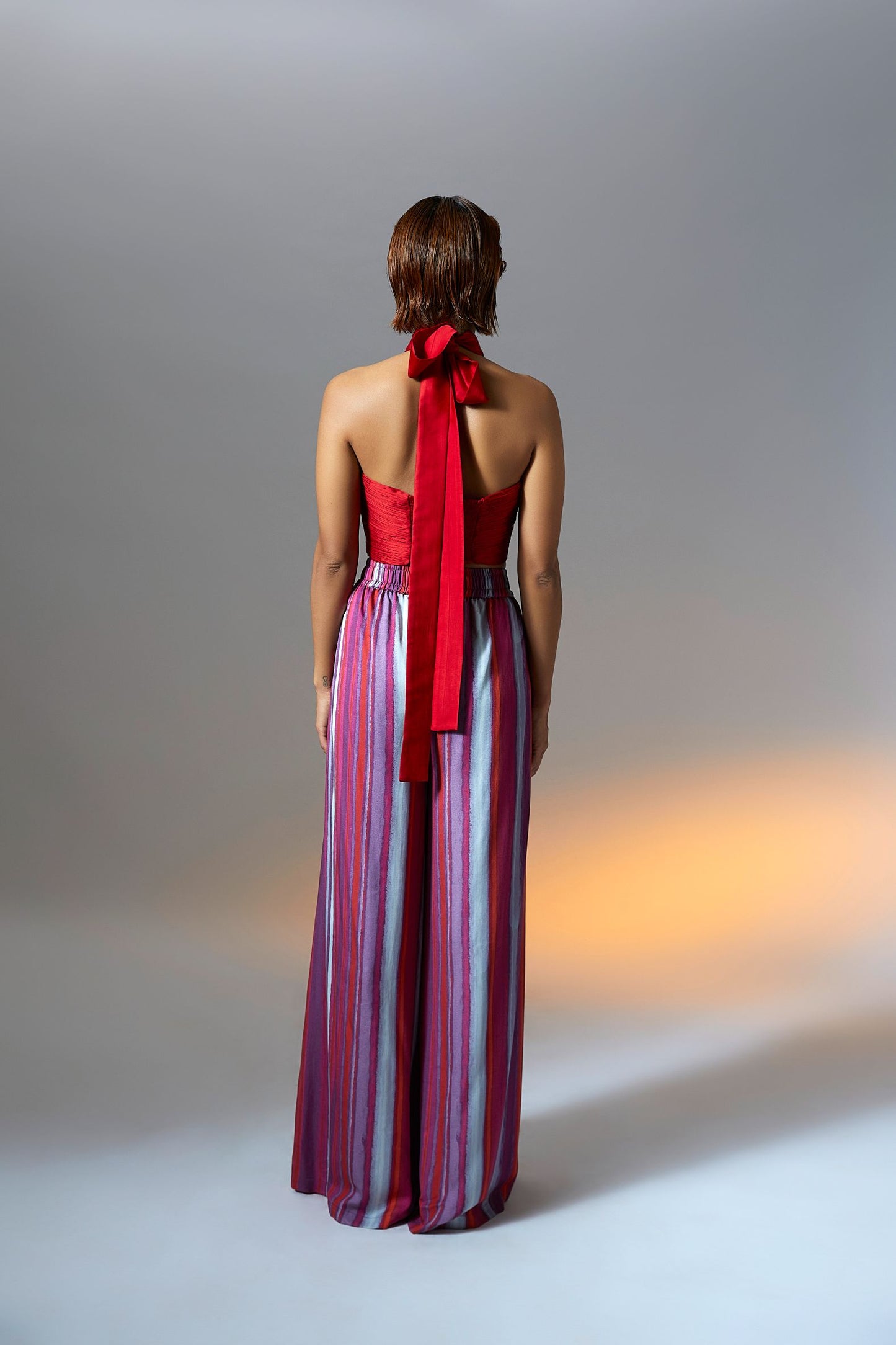 Handmade with modal satin fabric halter neck drape top in red from Aroka.