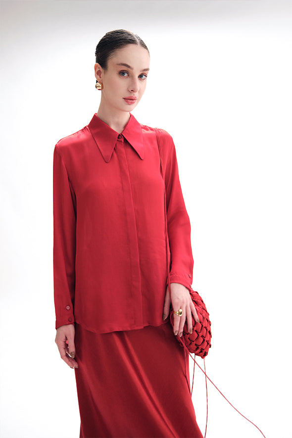 Full-sleeve red modal satin shirt featuring a high-low hem with an apple cut from Aroka.