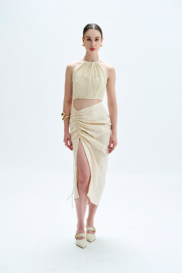 Creme halter neck tie-up top made of handwoven muslin fabric from Aroka.