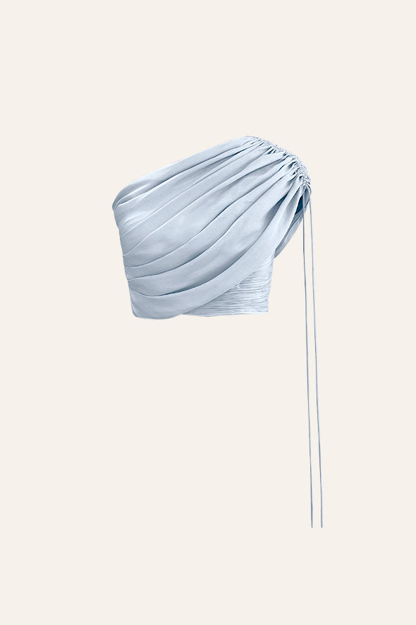 Blue pastel top with ruching details and adjustable sleeves with drawstrings from Aroka.