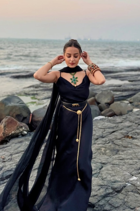 Tarini Manchanda in Shadow Dream Set by Aroka. a black slip dress with the scarf for your elegant parties.