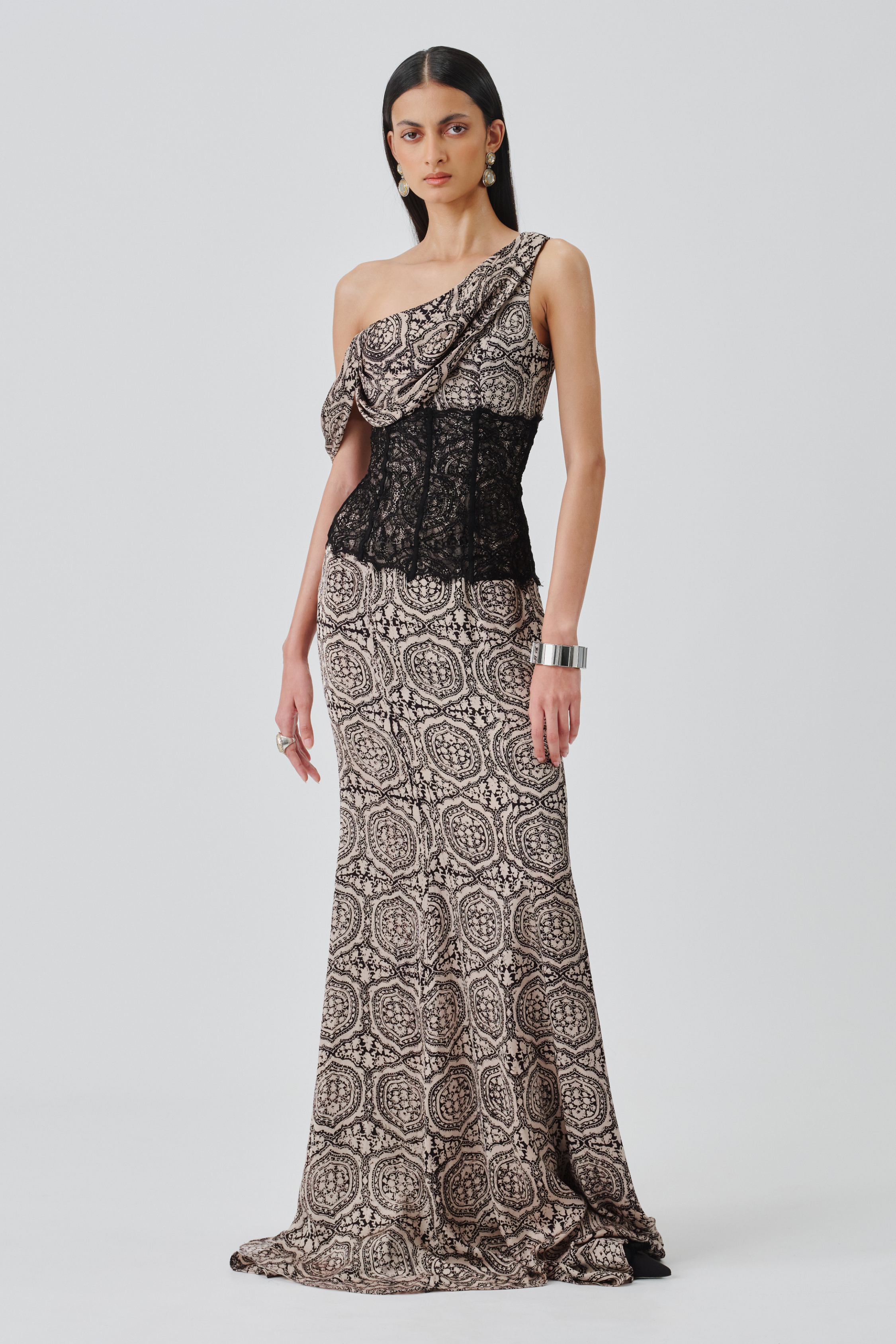 Model wearing a Tara ajrakh gown, showcasing the full view of the dress