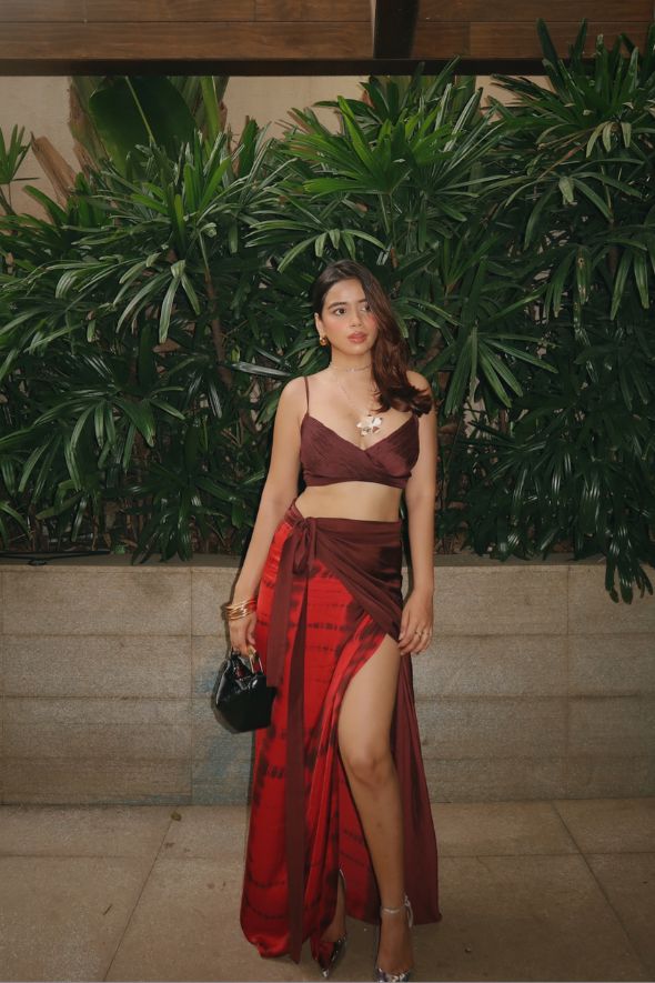 Riptide Skirt in Vertical Red Tie-dye and Solid Brown Multiway Drape Skirt from Aroka.