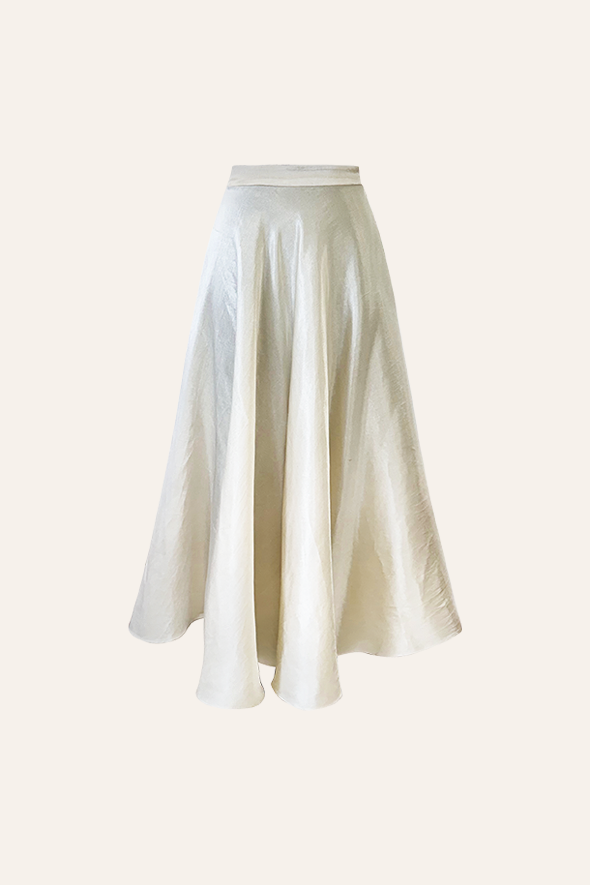 White flared skirt crafted from vegan mashru fabric with side zipper from Aroka.