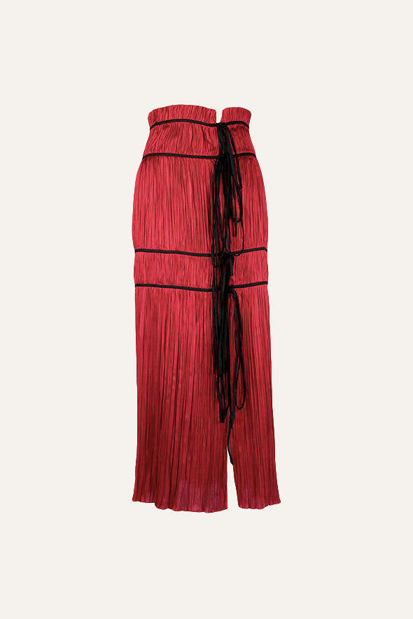 Amour halter neck top with black piping details and back tie-ups paired with Amour skirt in red from Aroka.