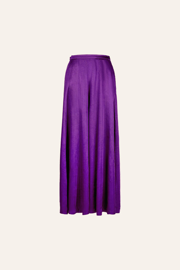 Purple draped off shoulder, asymmetric top with Soiree pants from Aroka.