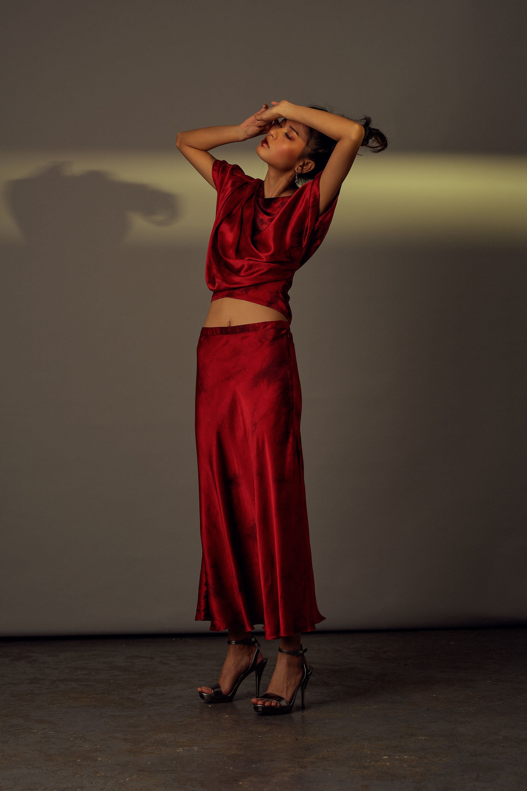 Modal satin crimson sheen a with black tie-dye patterns from Aroka.