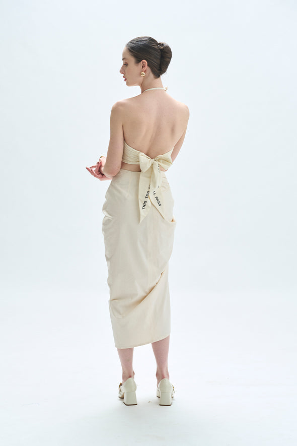 Creme halter neck tie-up top made of handwoven muslin fabric from Aroka.