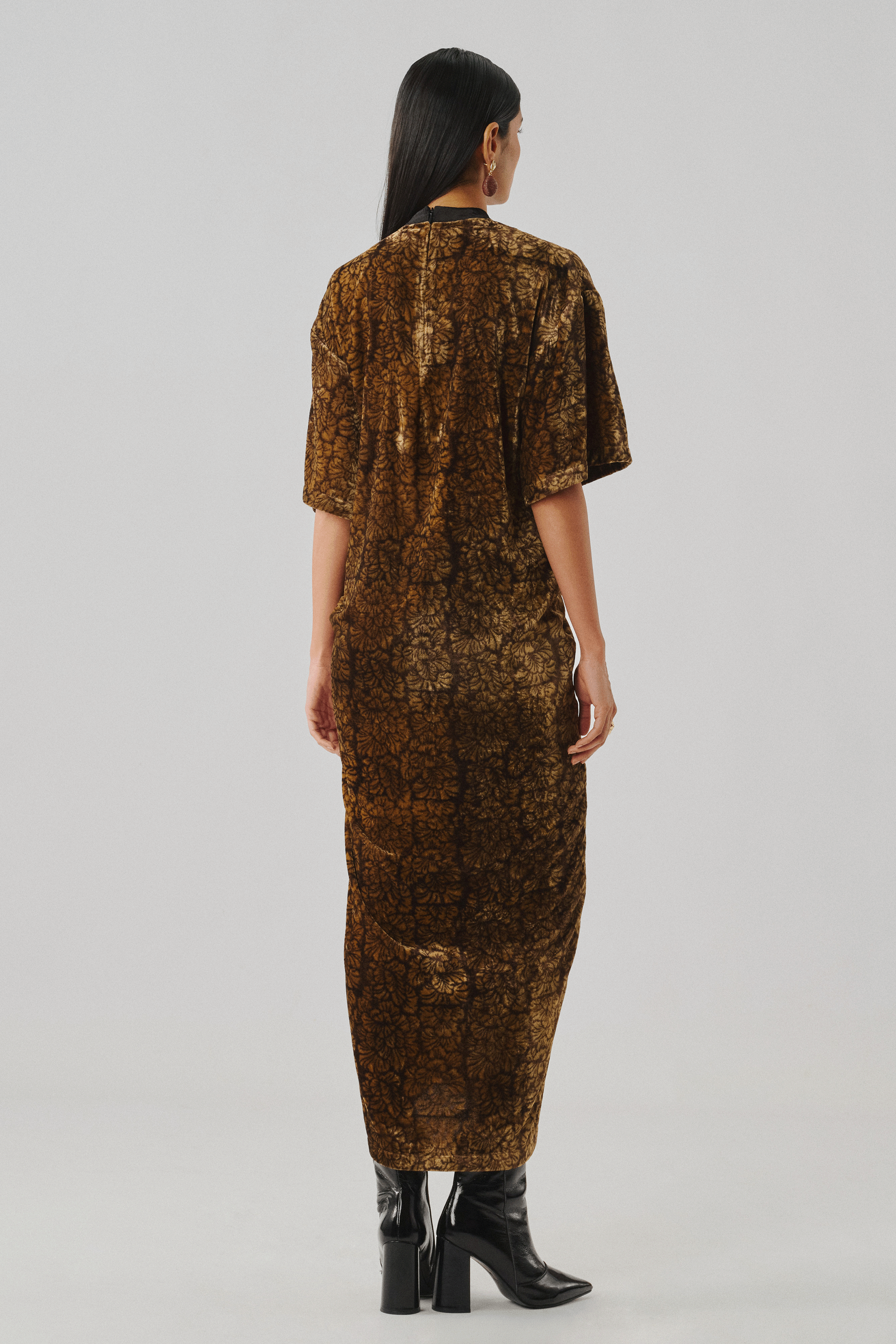 Bronze textured dress with a relaxed column fit, rear profile view