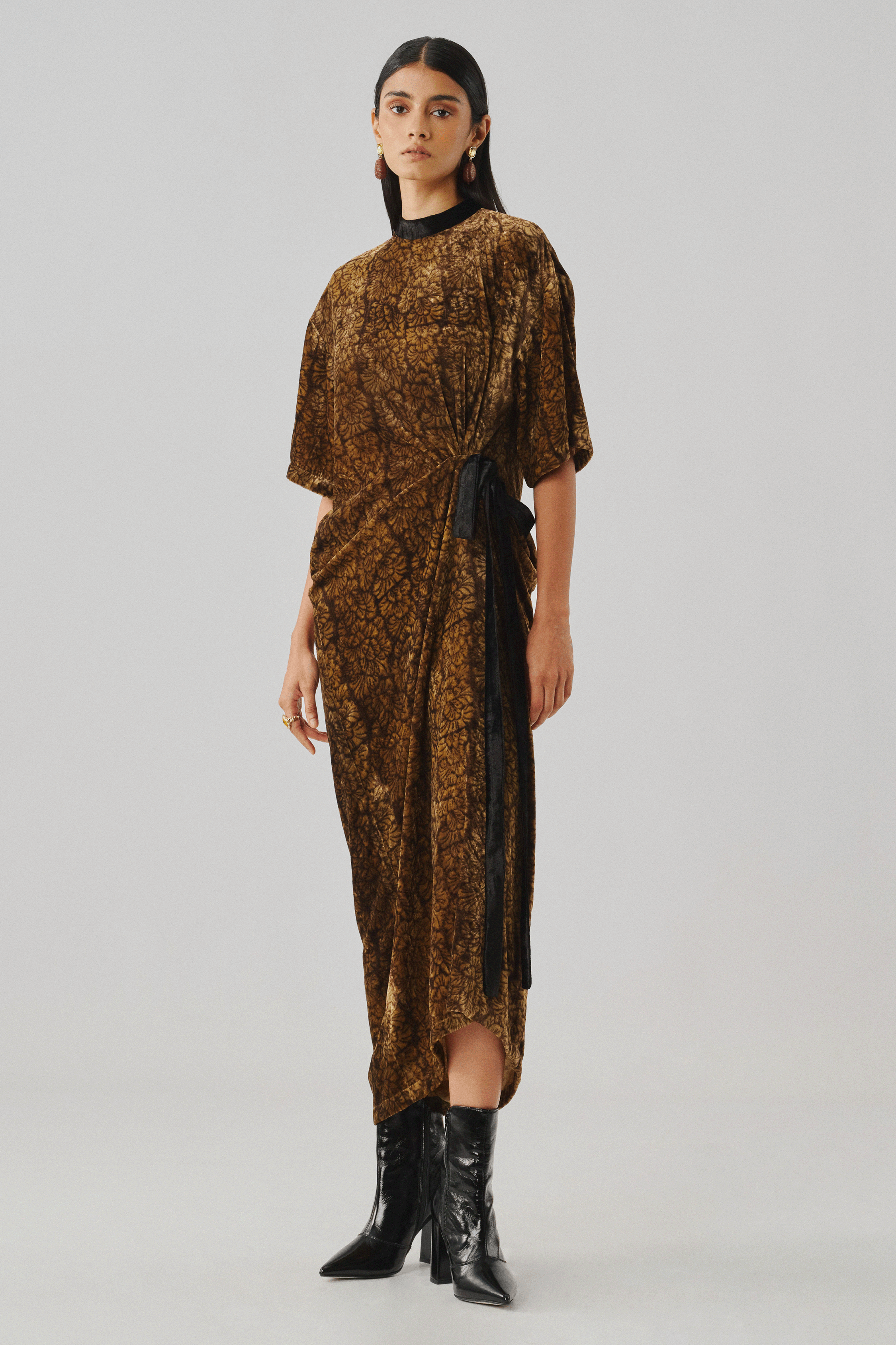 Bronze draped top with an asymmetric hem, front full-length view