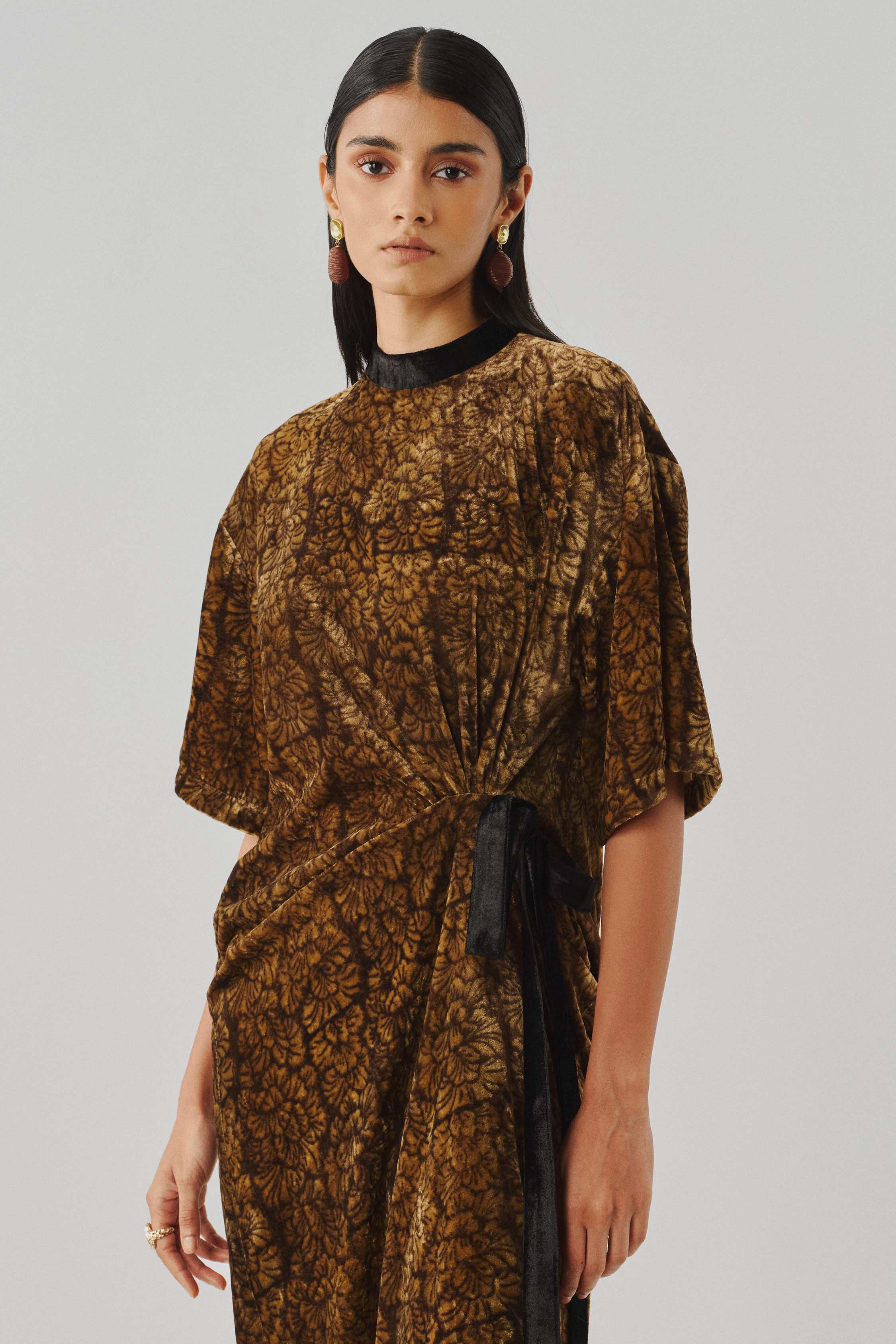 Close-up of bronze Ajrakh-print wrap top and matching wide trousers