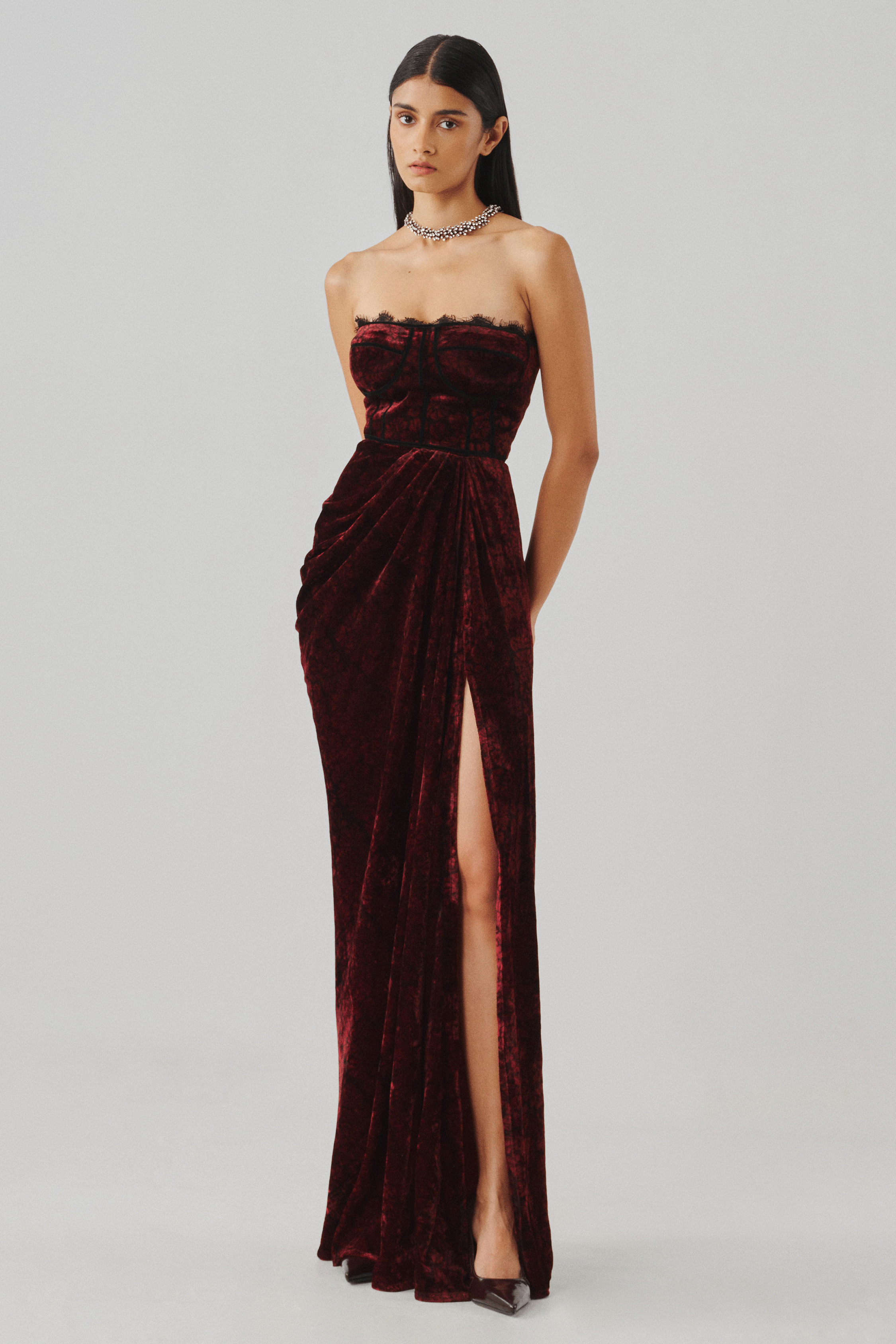 Burgundy velvet gown with a thigh-high slit, front full view