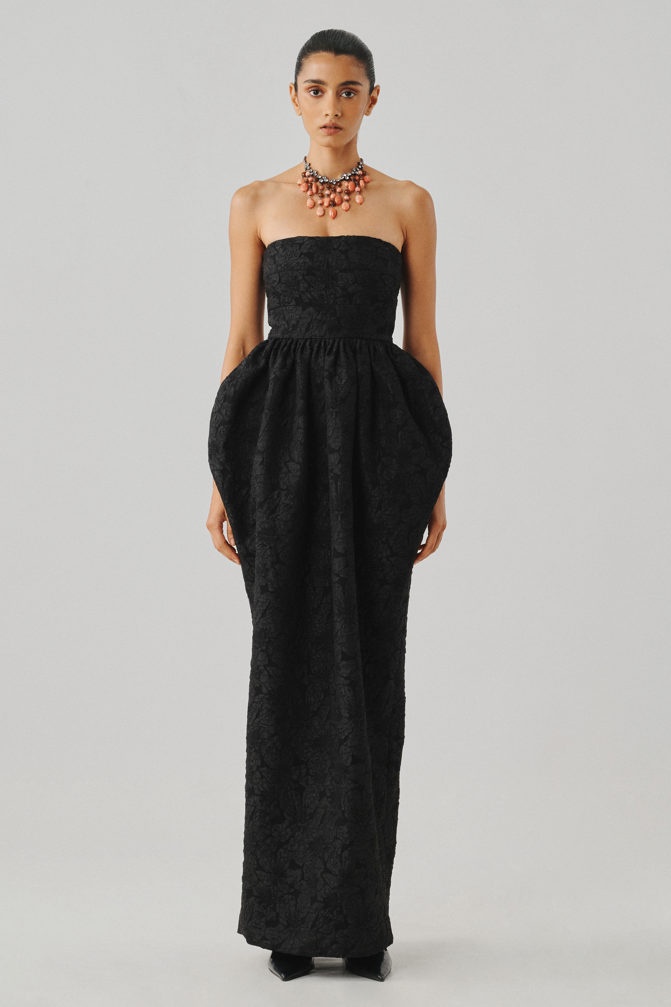Black tailored jumpsuit with a fitted bodice, front full view