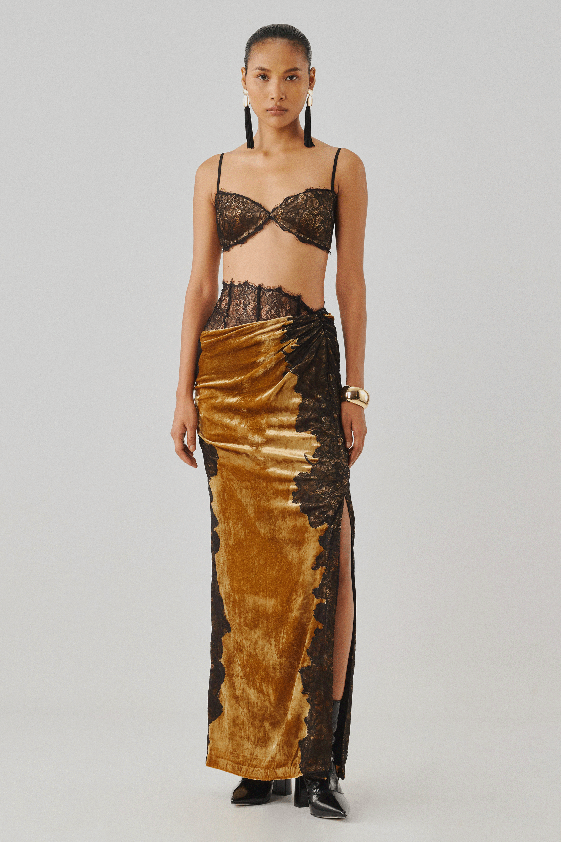 Bronze printed wrap top with a matching draped skirt, close-up