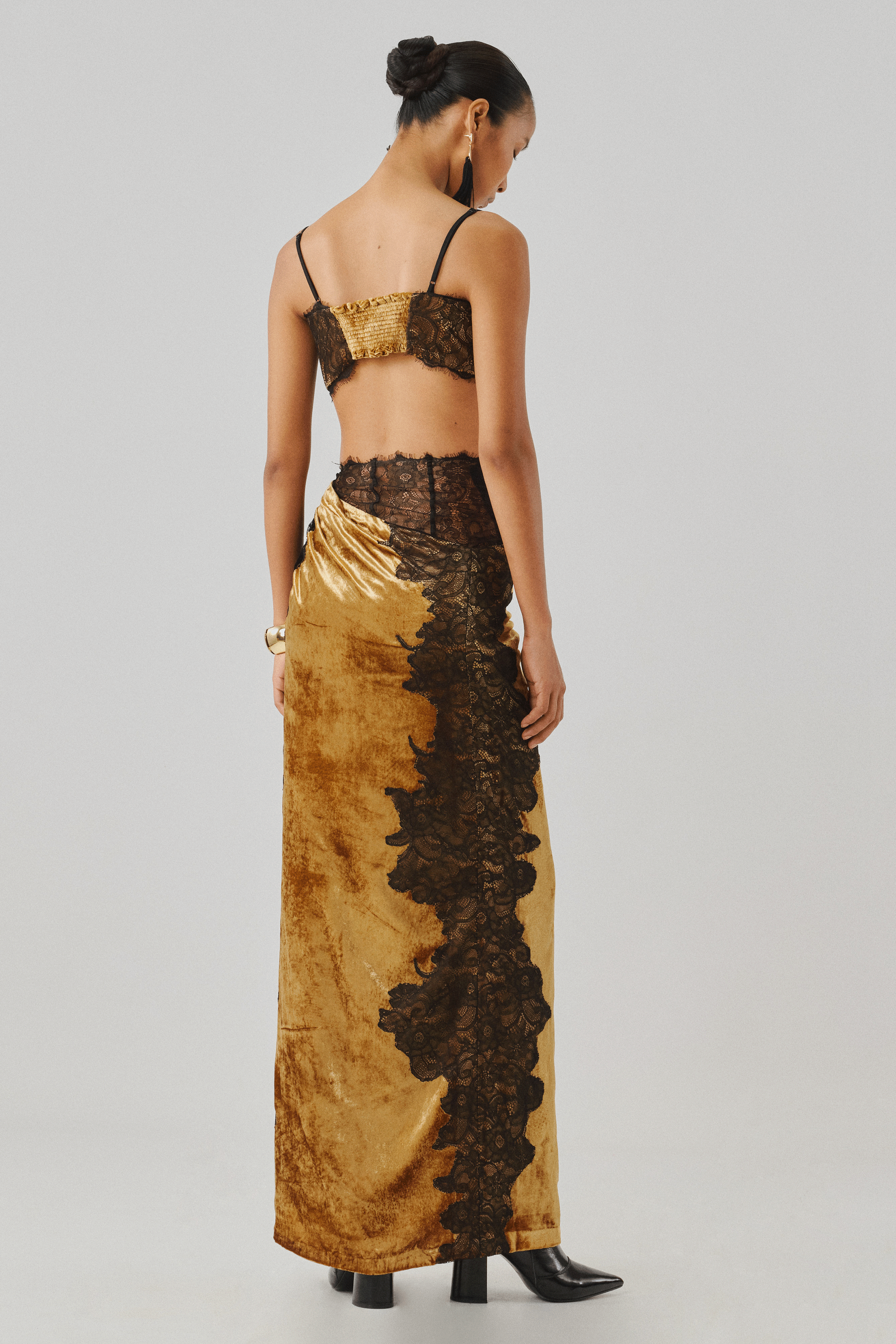 Bronze printed wide-leg trousers with a lace top, rear view