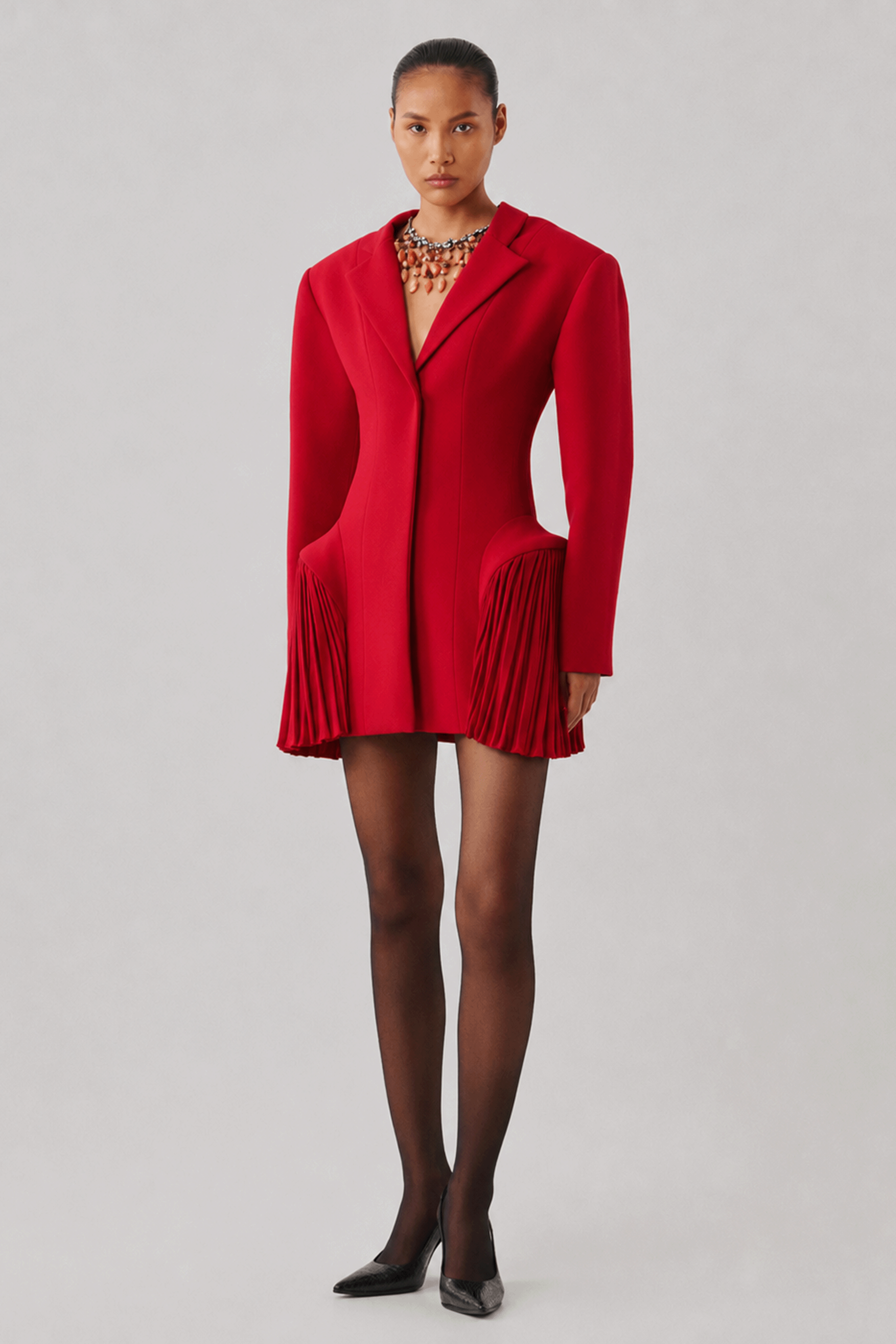 Red fitted mini dress with long sleeves, front full-length view