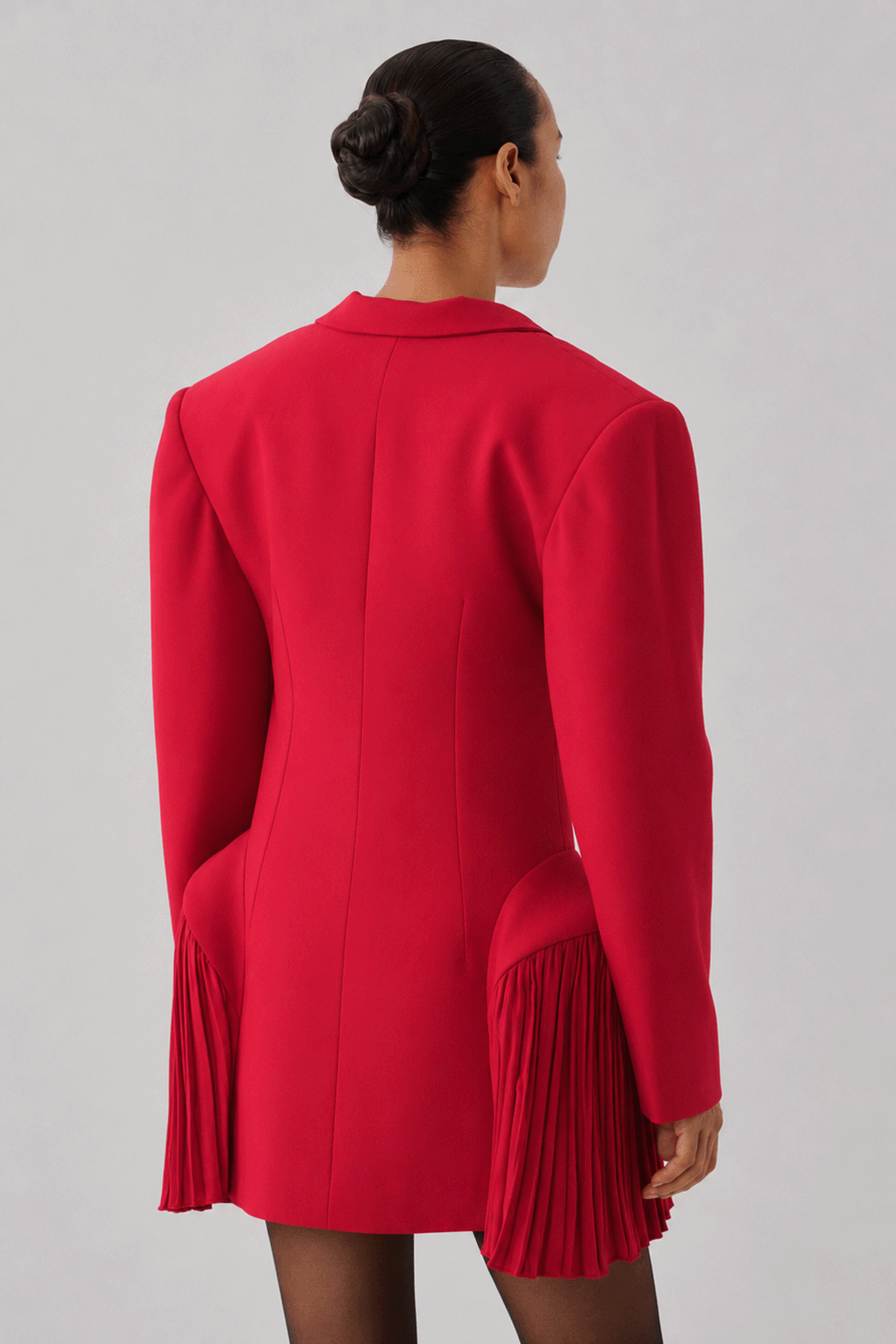 Red mini dress with long sleeves, side profile full view