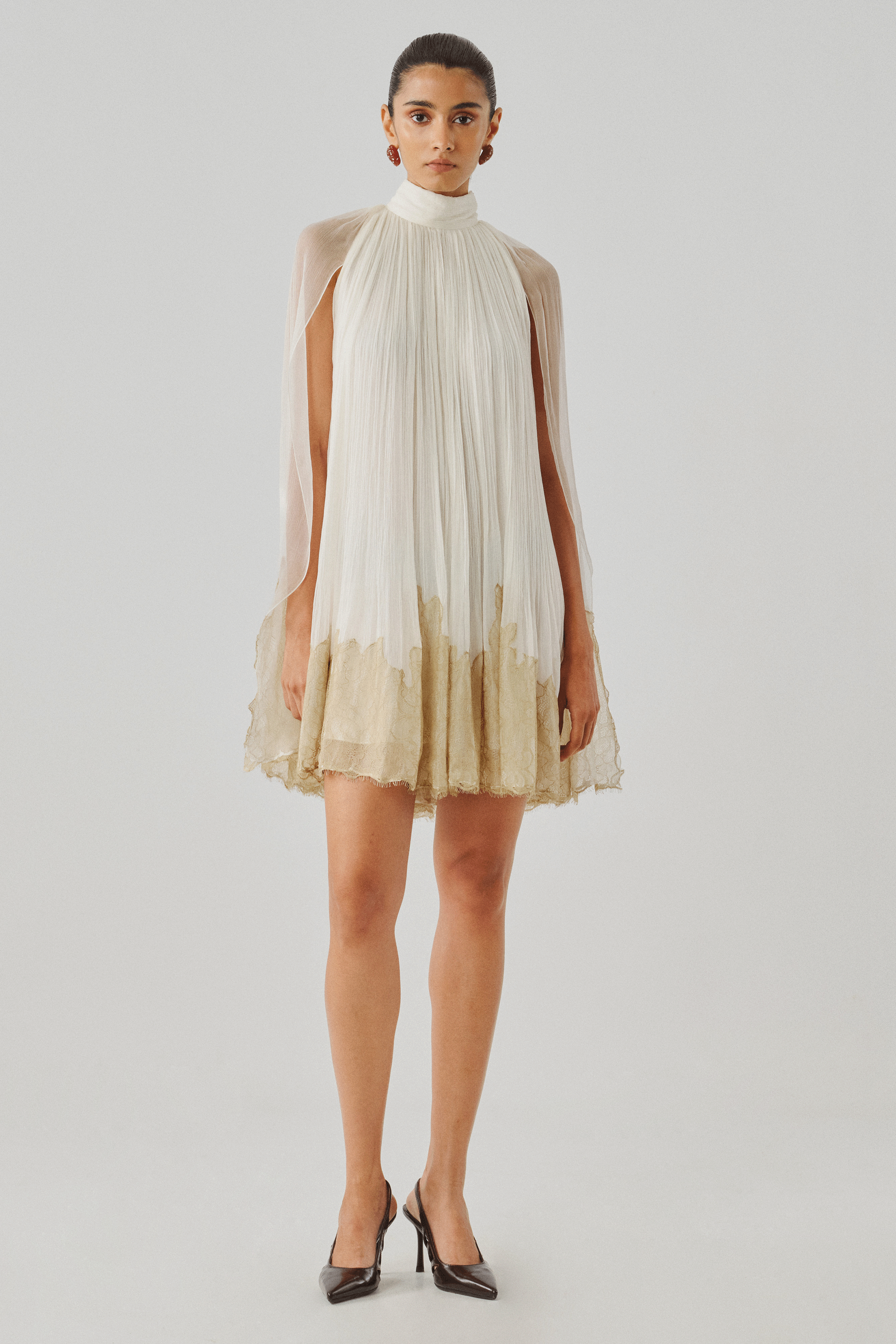 Ivory tiered mini dress with dip-dyed gold hem, front full view