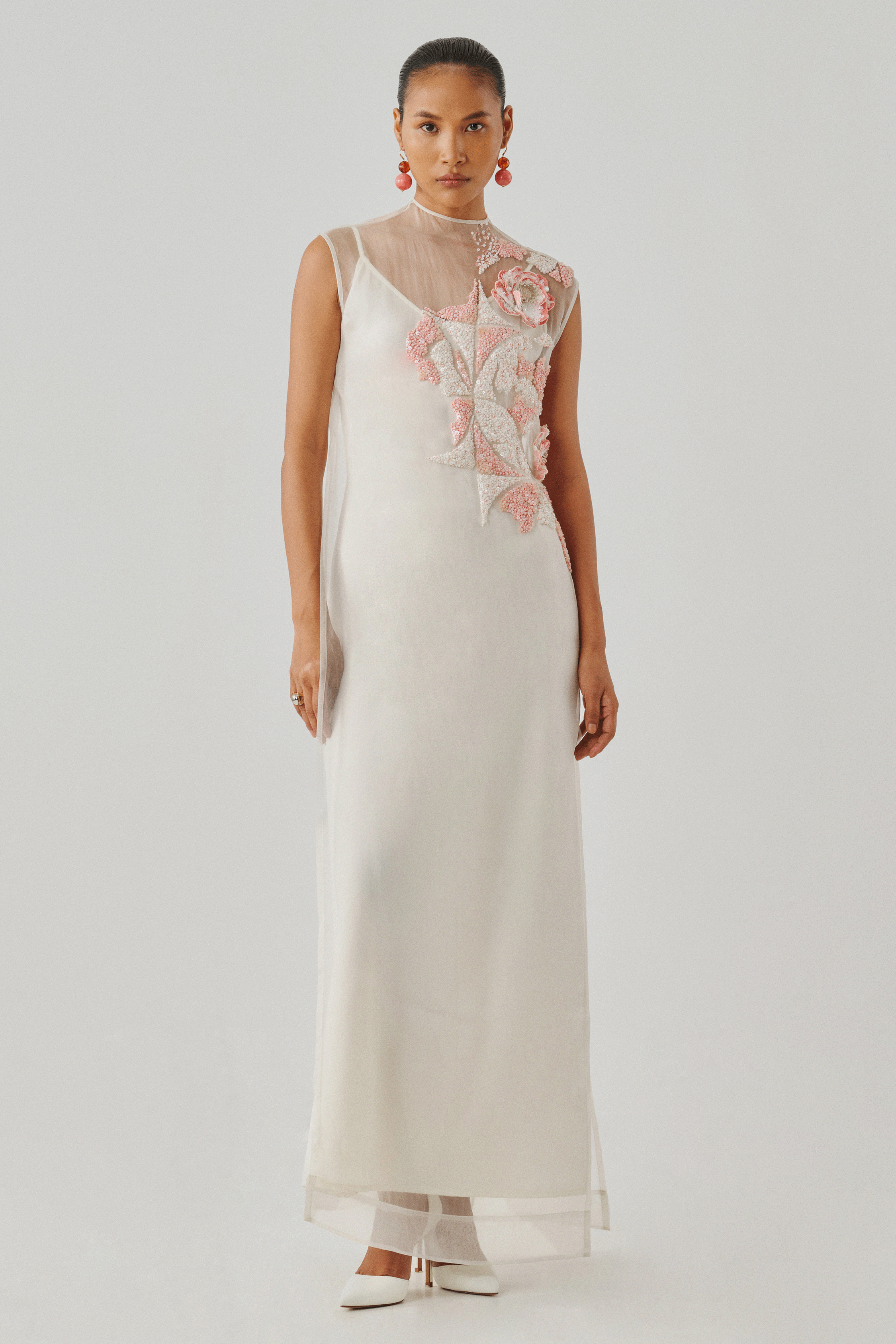 Ivory dress with a hand-embellished floral appliqué, front full view