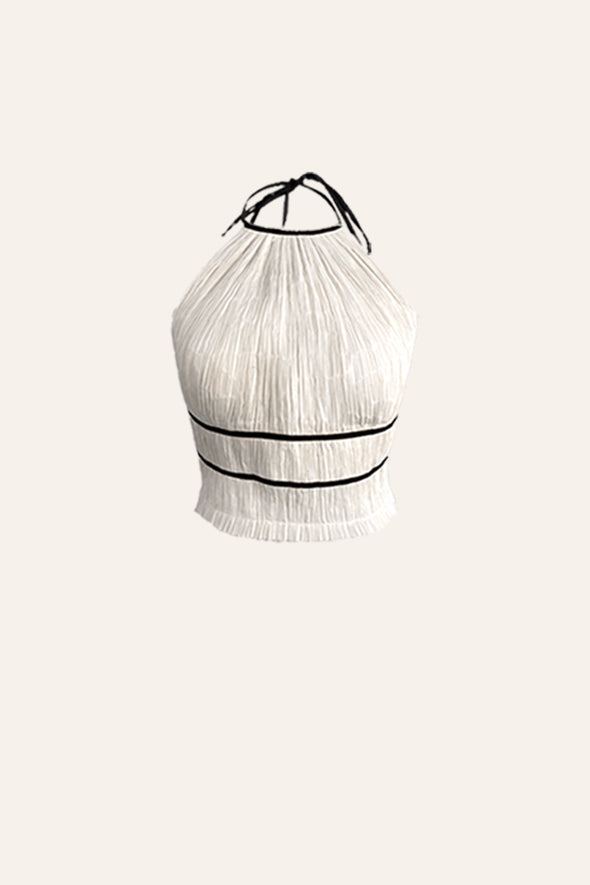 Modal satin ruched halter neck top with back tie-ups and black piping details in creme by Aroka.