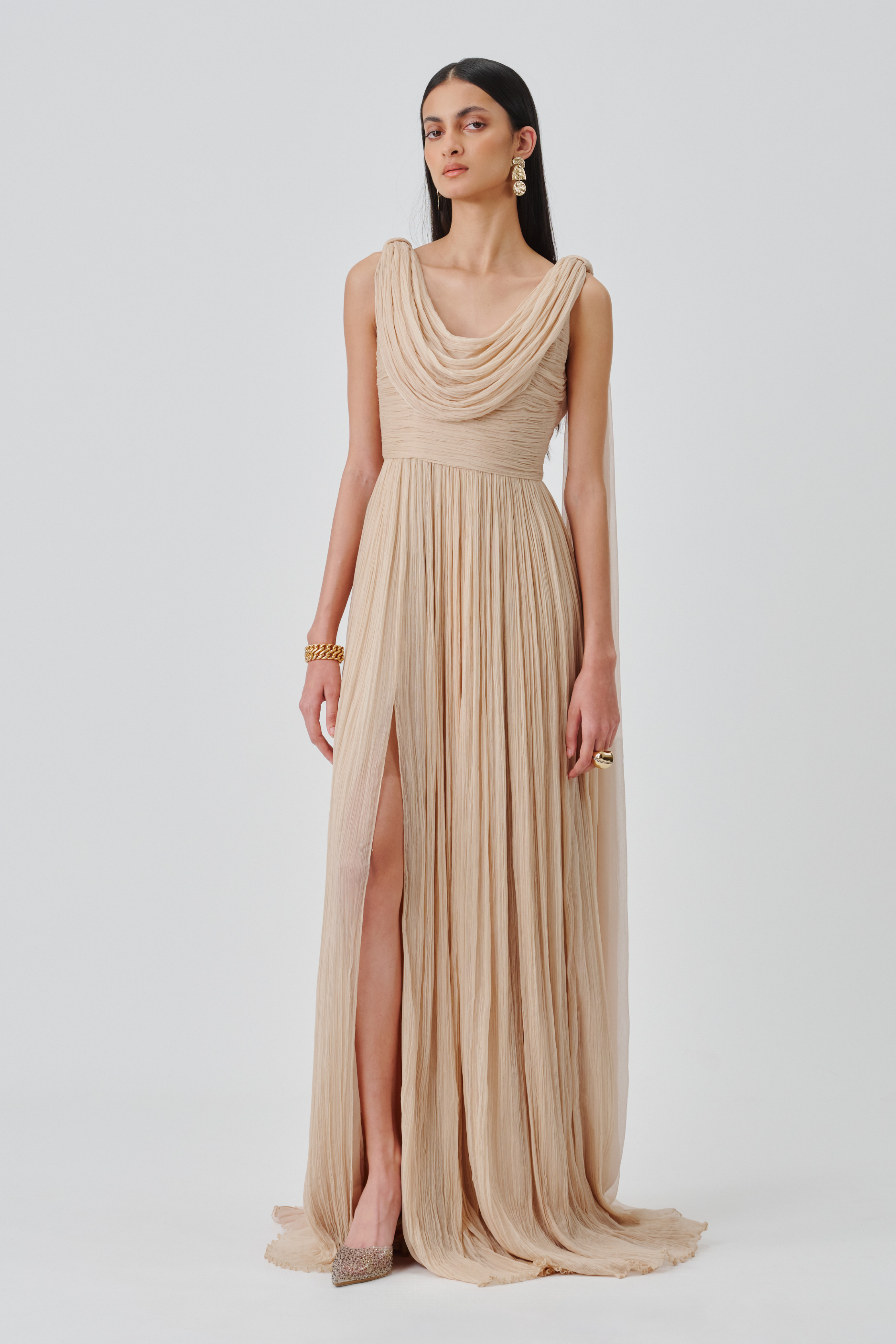 Model wearing Athena ruched gown , showcasing the full view