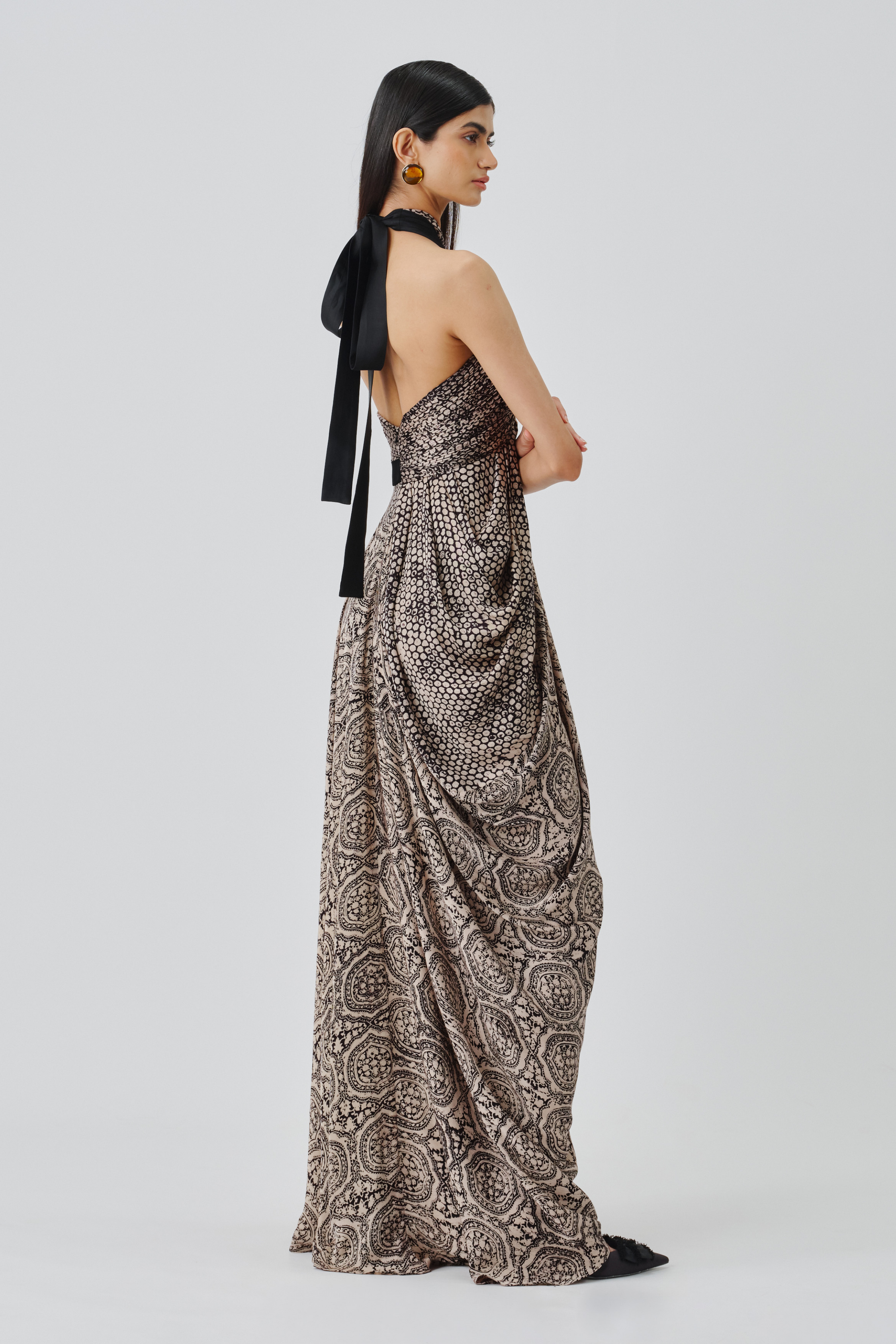 Side profile view of aveline halter gown