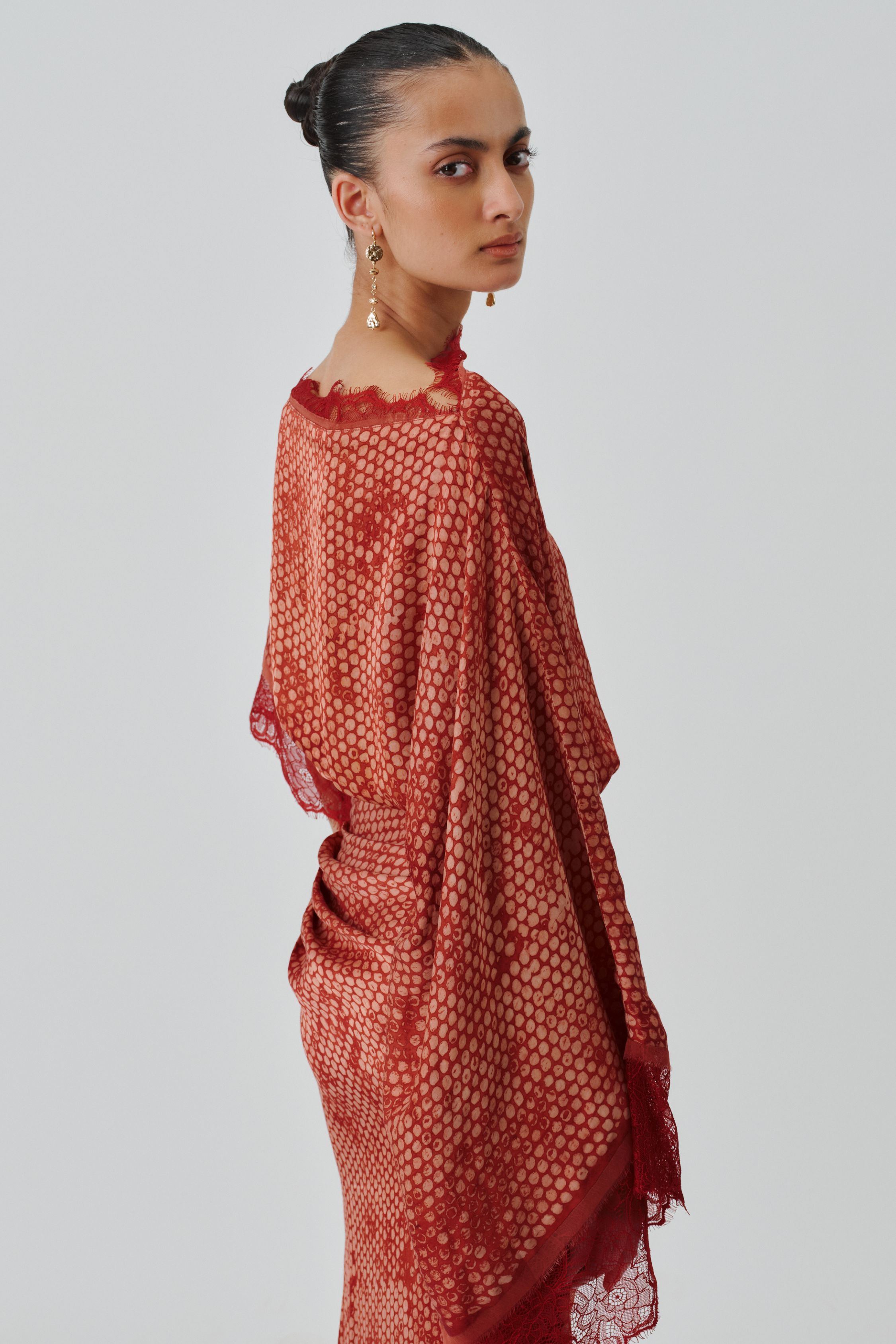 Side profile front view of mehr dress