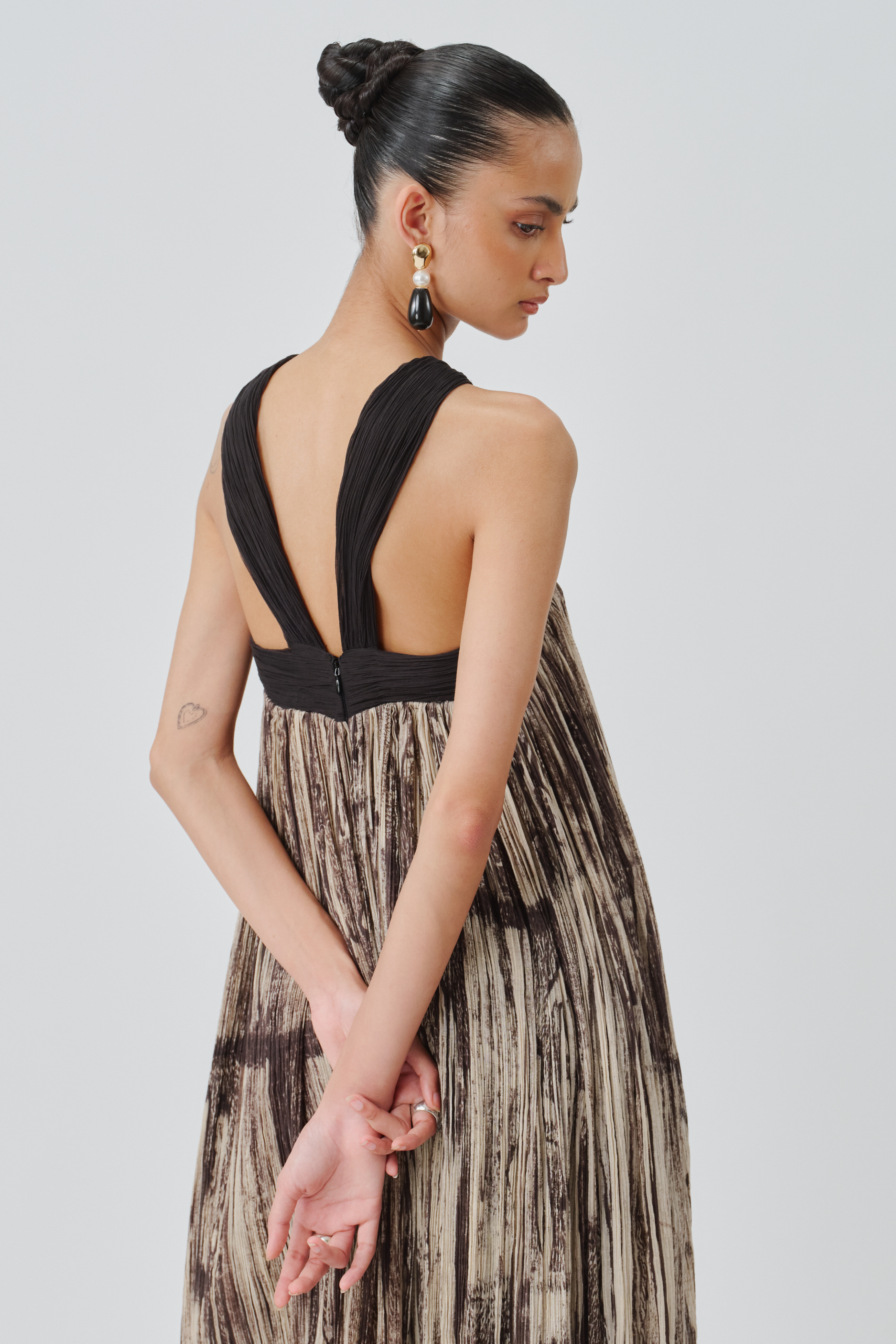back view of dusk mulmul dress top