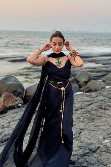 Tarini Manchanda in Shadow Dream Set by Aroka. a black slip dress with the scarf for your elegant parties.