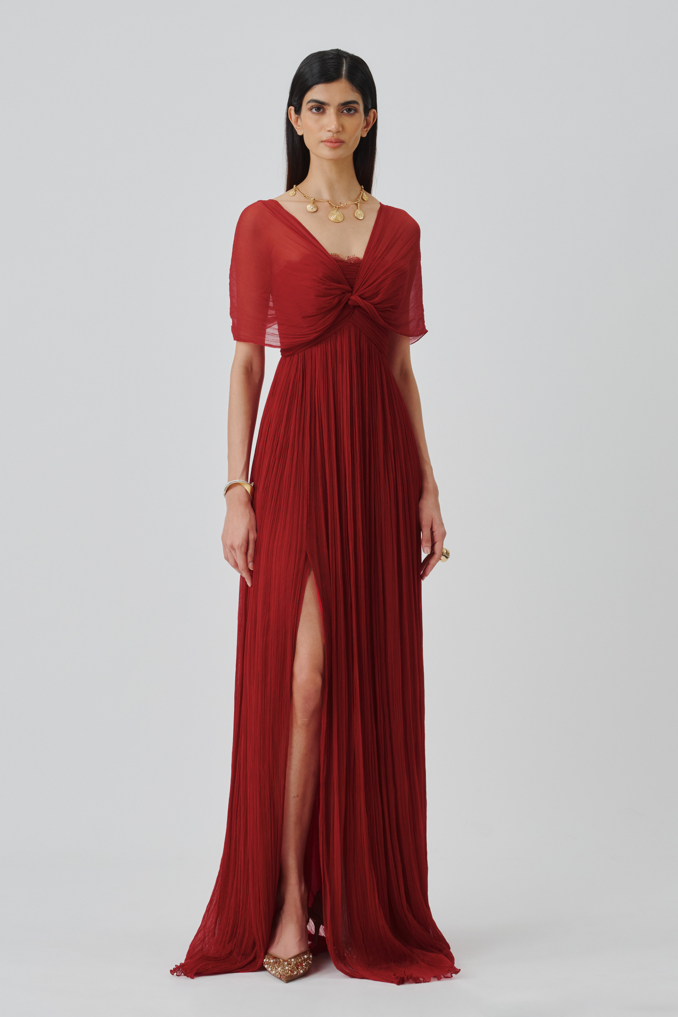 Model wearing an Scarlet Muse Ruched gown, showcasing the full view