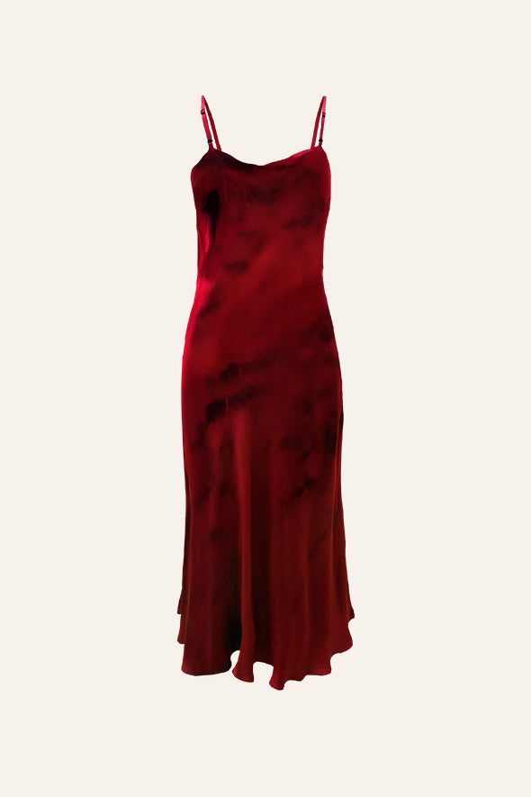 Slip dress with electric tie-dye patterns in red from Aroka.