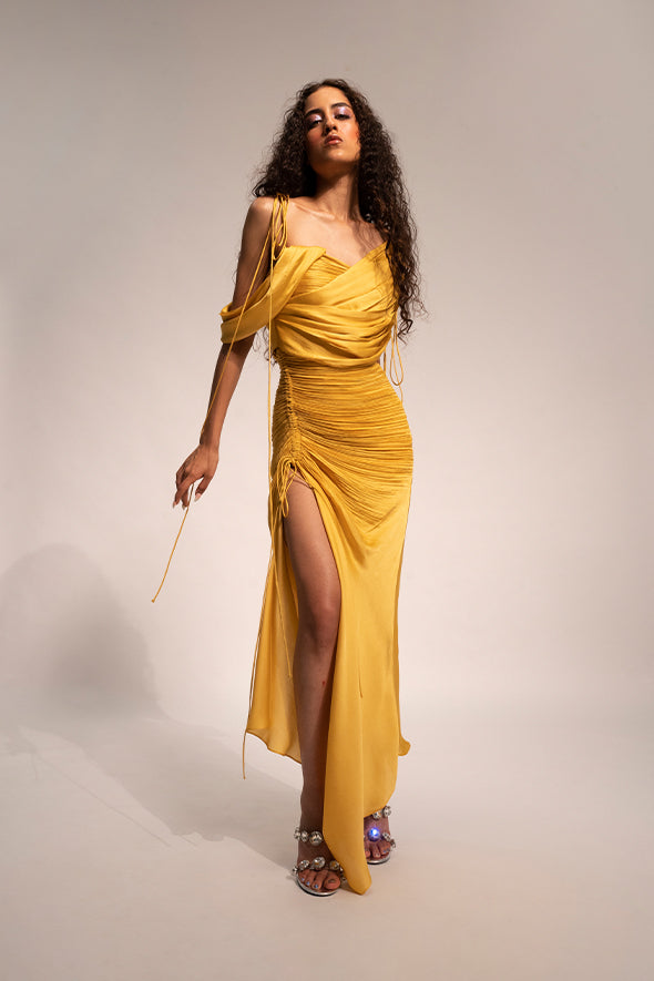 Modal satin with ruched details, an adjustable slit, shoulder tie-up and detachable drape sleeves from Aroka
