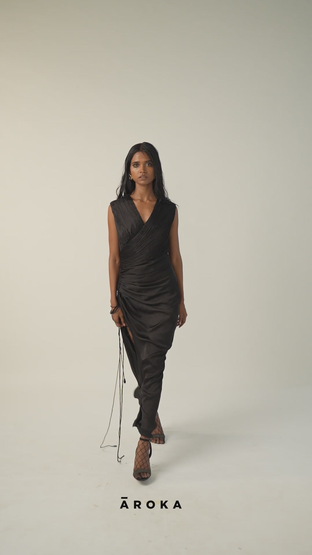 Black Ruched and Draped Satin Long Dress from Aroka.