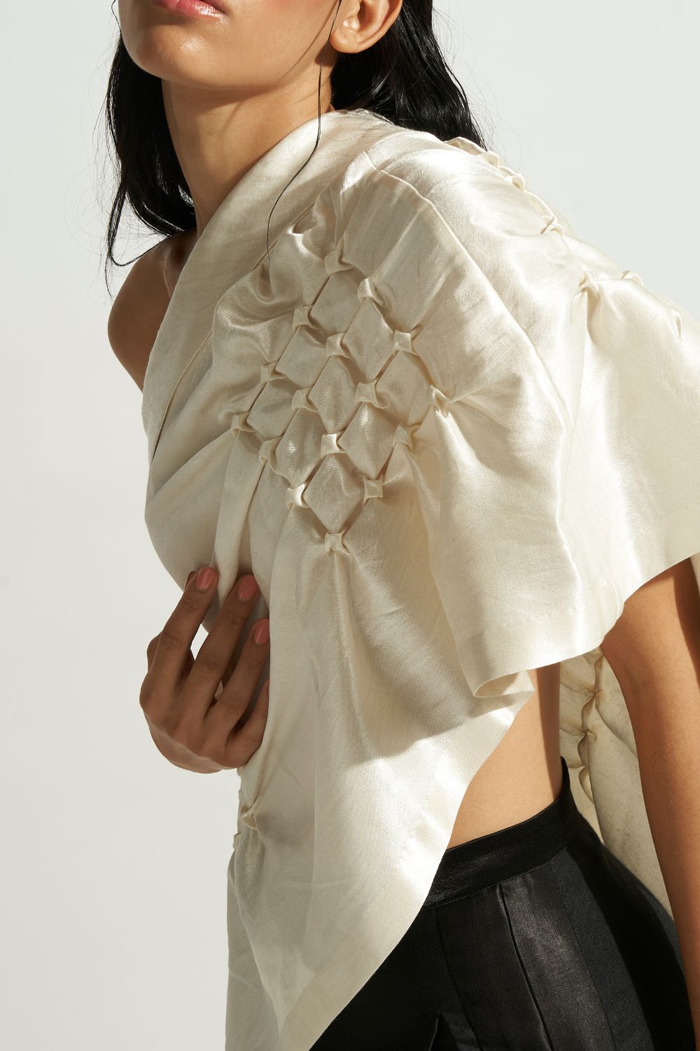 Mashru hand embroidered draped off shoulder, asymmetric top in off-white from Aroka.