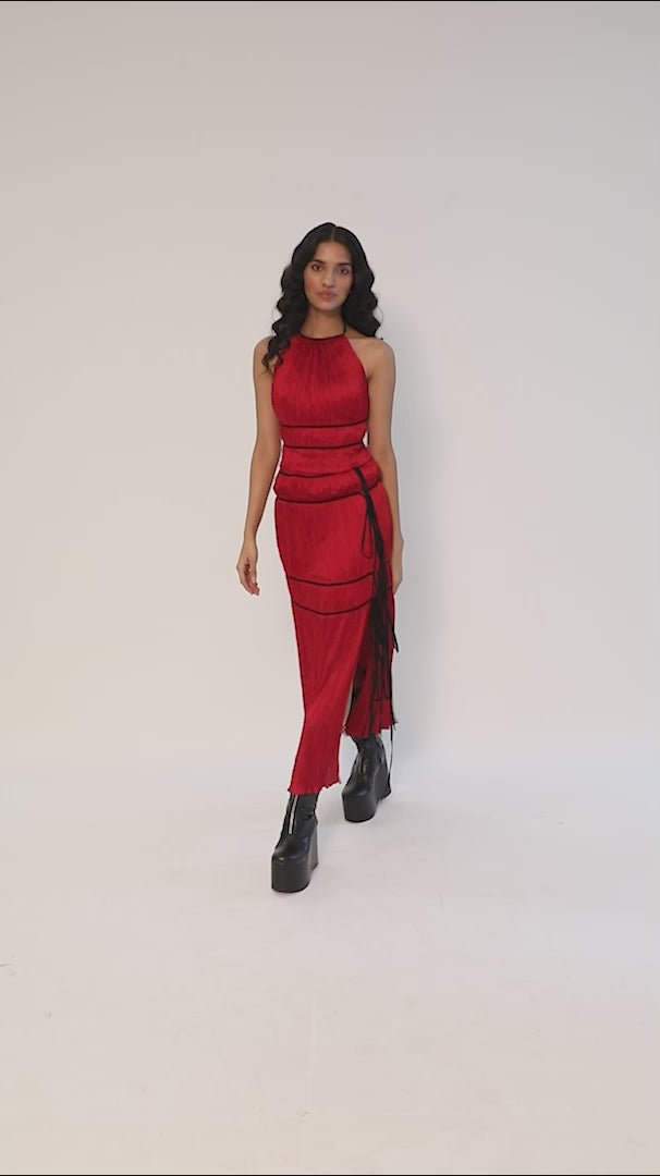 Modal satin ruched halter neck top with back tie-ups and black piping details in red by Aroka.