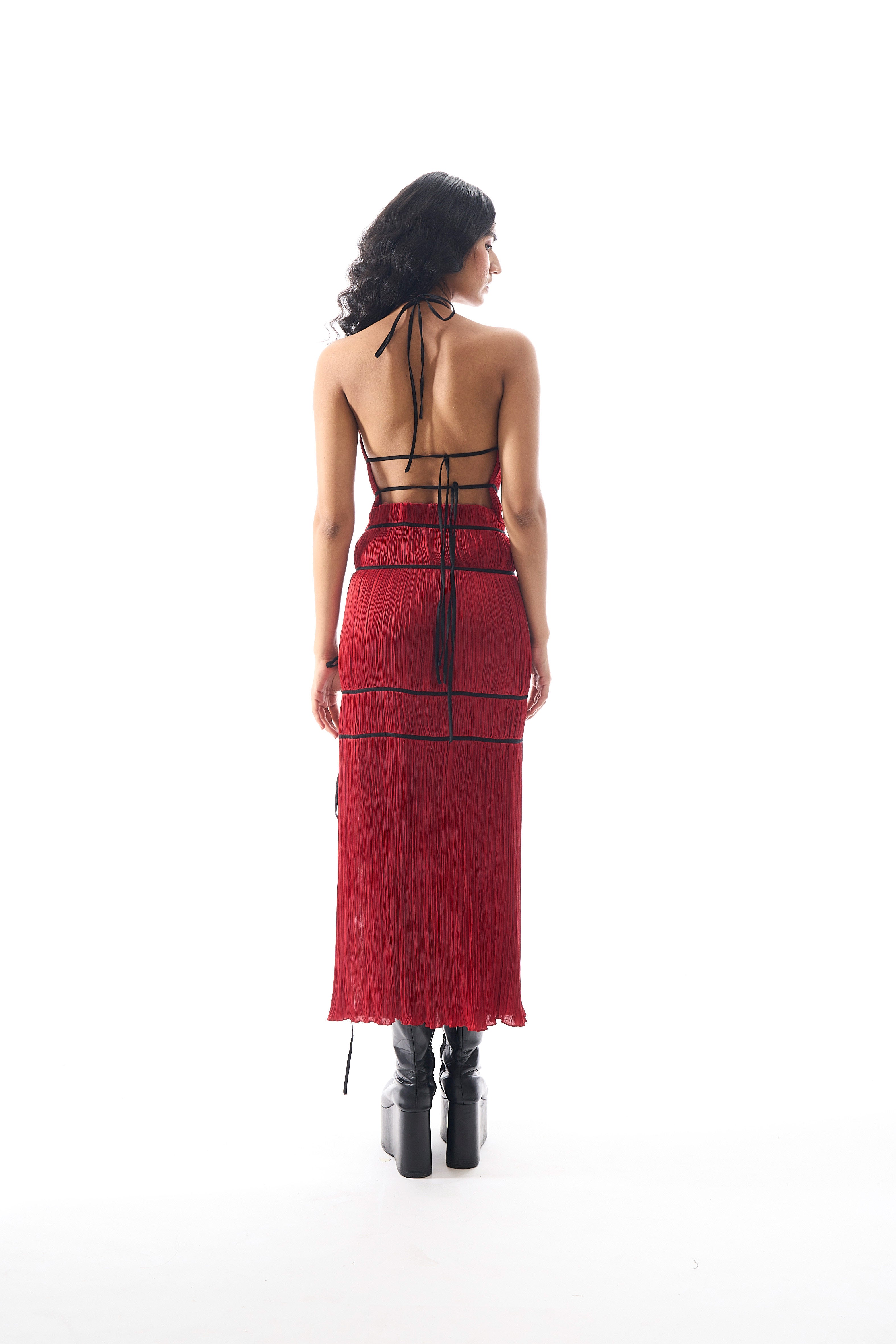 Modal satin ruched halter neck top with back tie-ups and black piping details in red by Aroka.
