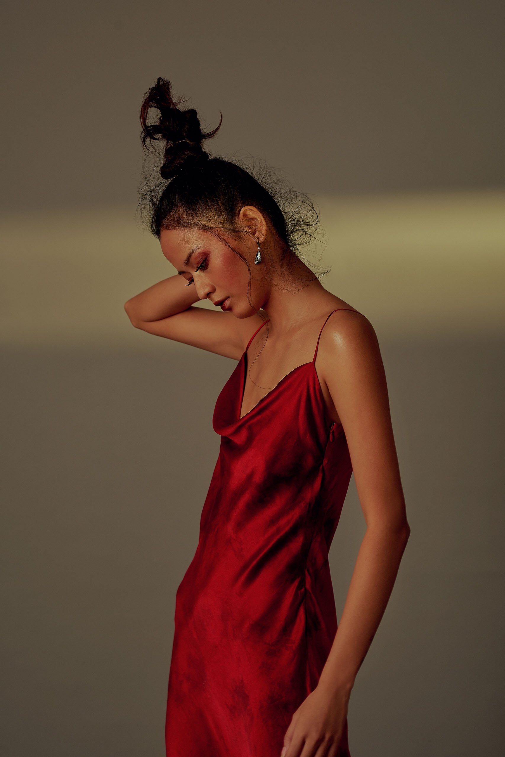 Slip dress with electric tie-dye patterns in red from Aroka.