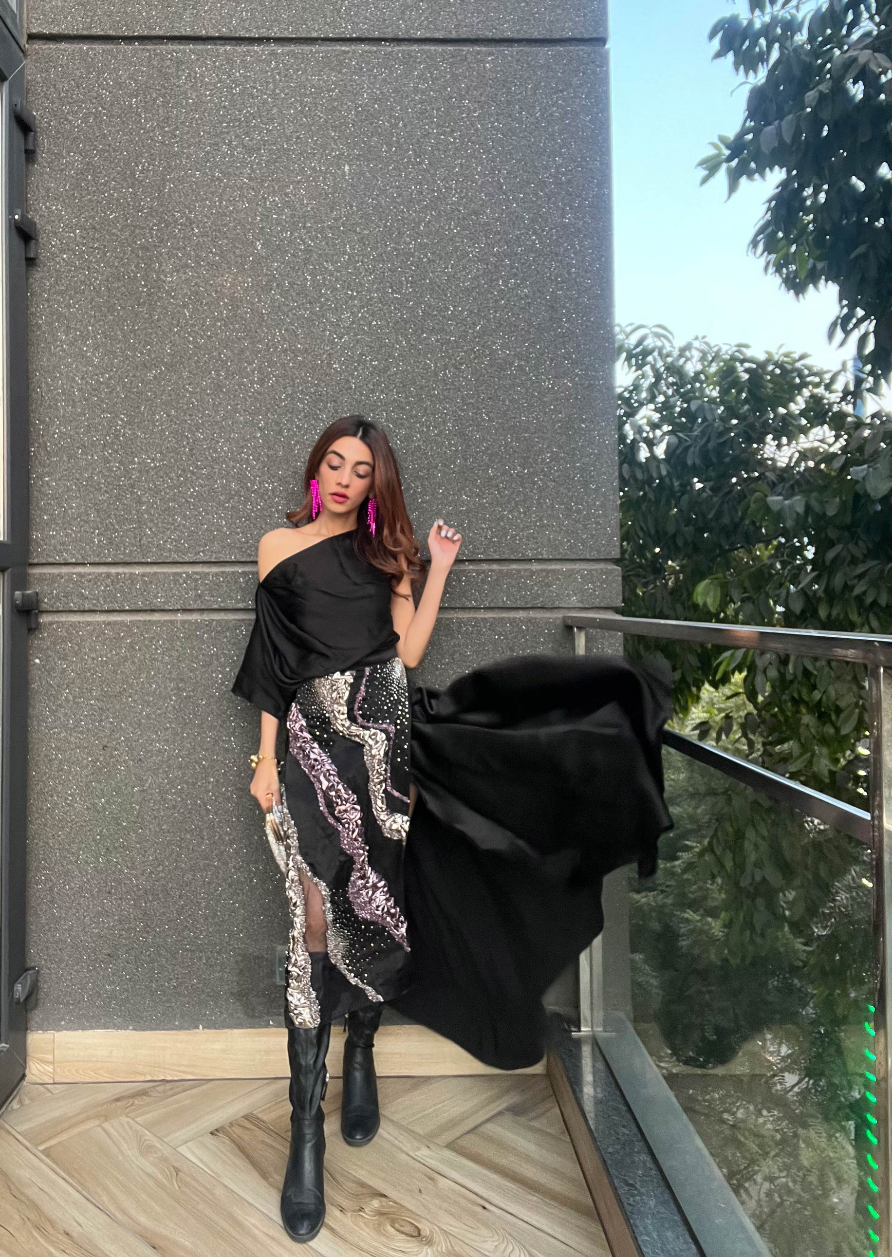 Loose fit black off-shoulder cowl drape top from Aroka.
